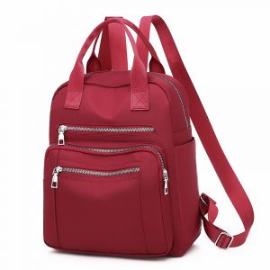Reise-Rucksack mit großem Fassungsvermögen, einfarbig rot mit weißem Hintergrund